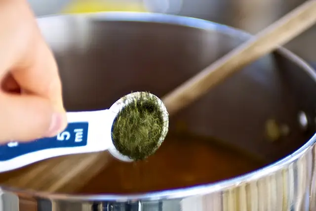 Add dill into pan.