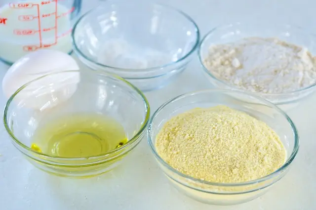 While the chili is simmering, prepare the cornbread topping.
