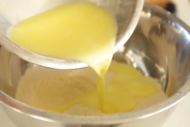 Pour into flour mixture.