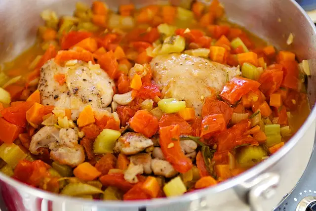 Return chicken to pan.