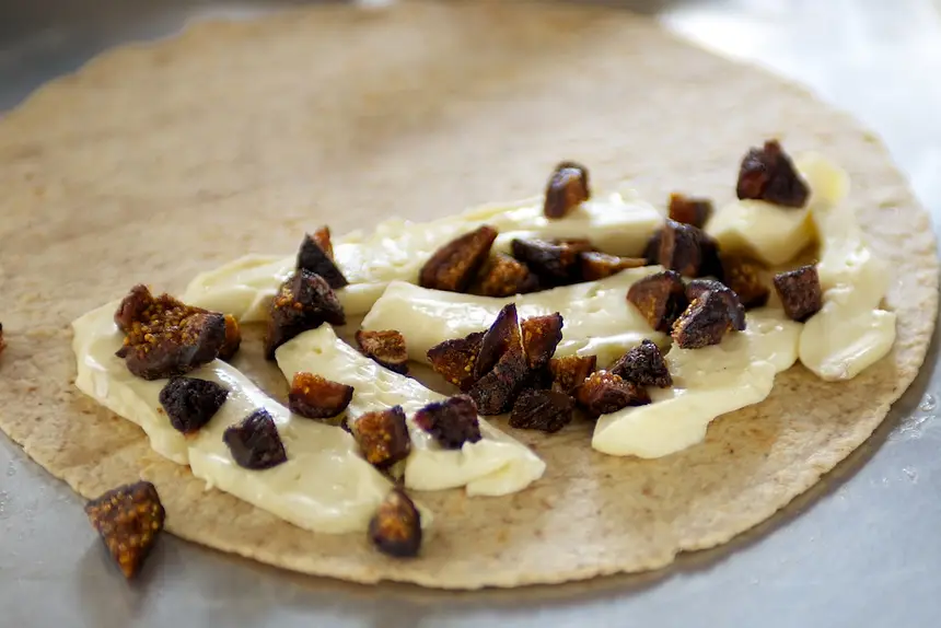 Sprinkle chopped figs evenly over the cheese.