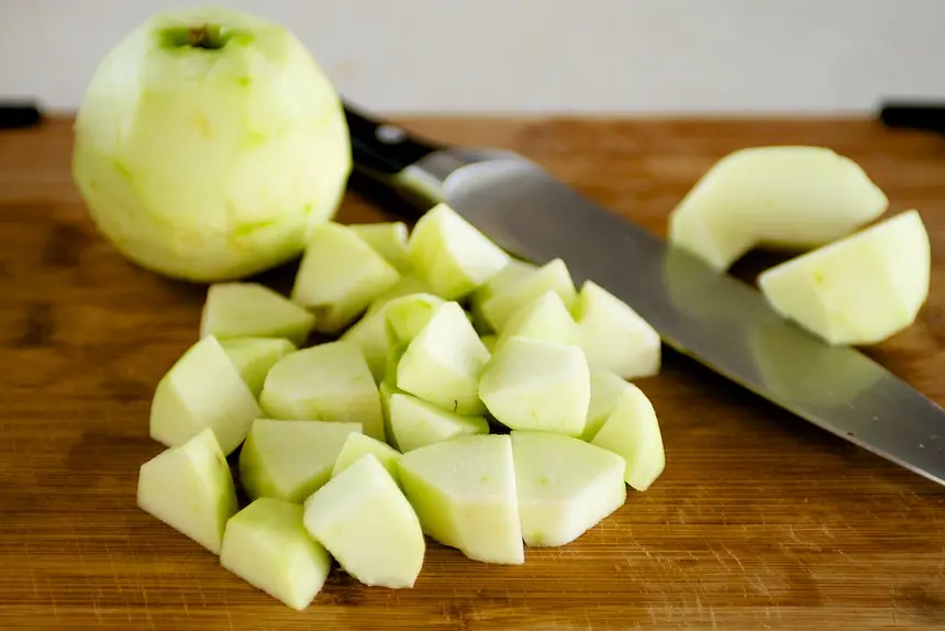 Next peel, core and chop the apples into small chunks.