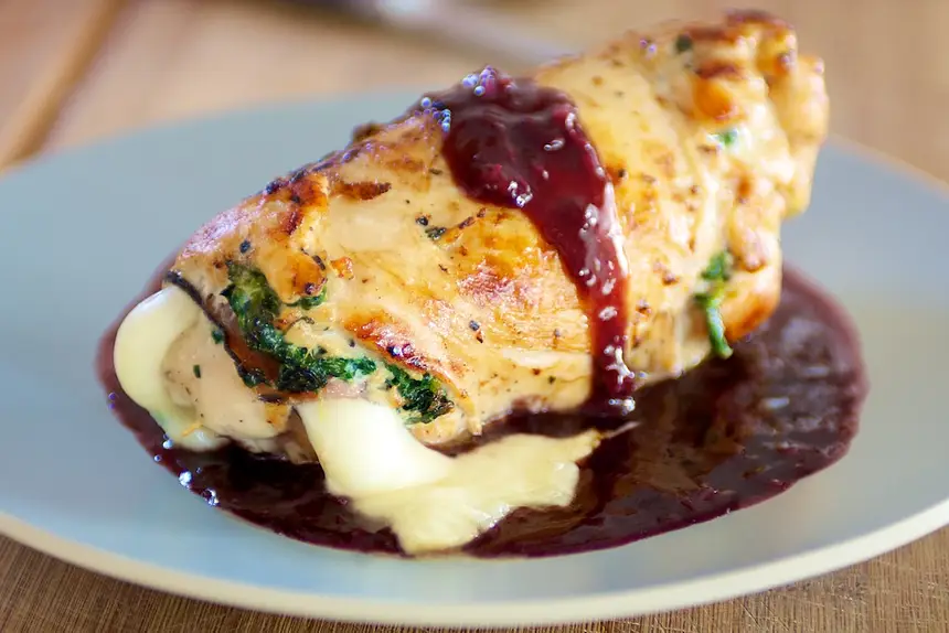 Drizzle more sauce over chicken breast.