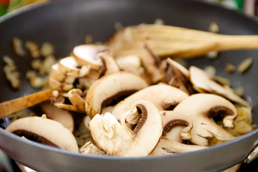 Stir in mushrooms,