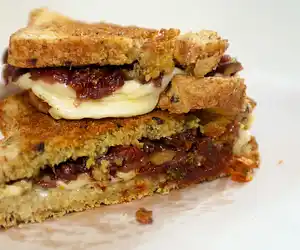 Caramelized Onion, Basil Pesto & Sun-Dried Tomato Grilled Cheese
