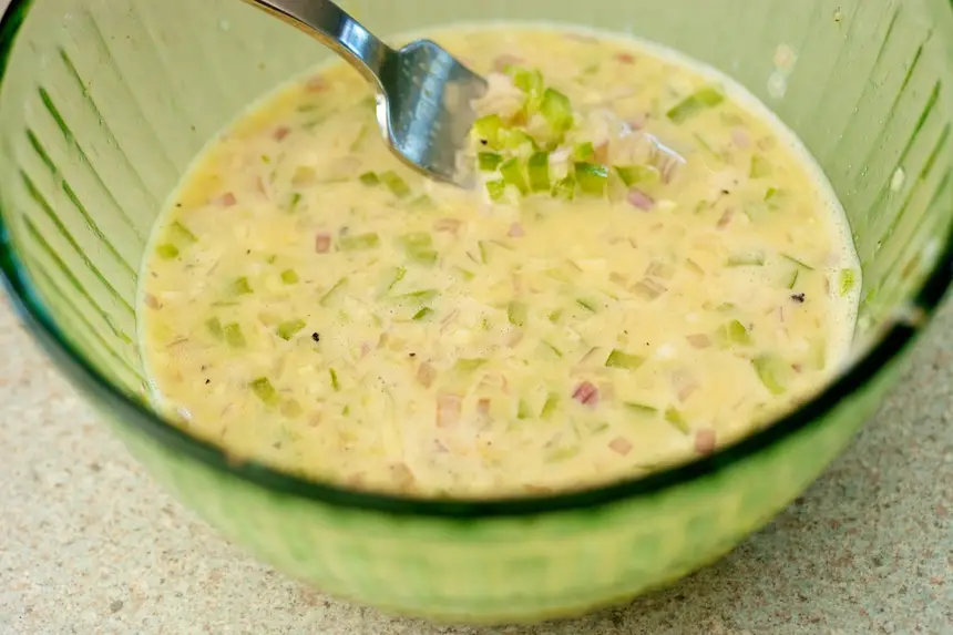 In a bowl, beat, eggs, salt and pepper.  