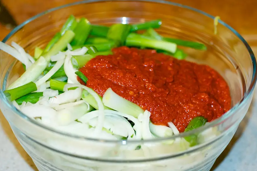In a large mixing bowl, 