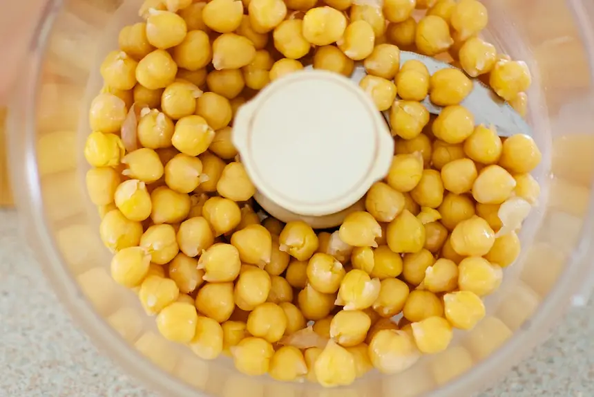 Process the chickpeas in a food processor until finely ground.