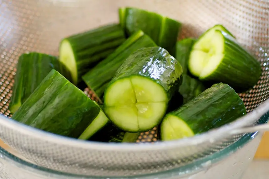 After 1 hour, drain the cucumbers and rinse with cold and running water twice. 