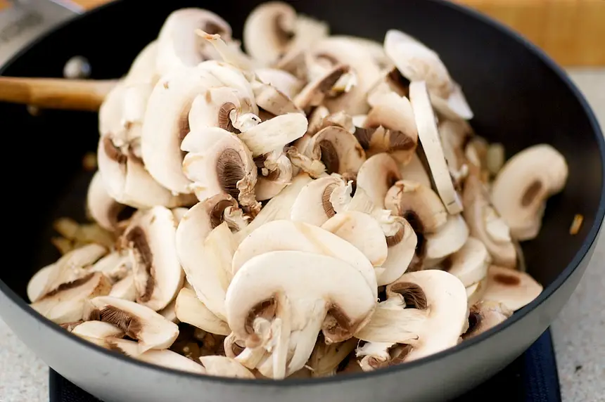 Stir in mushrooms, 