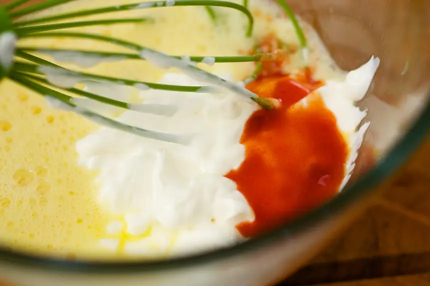 Add sour cream, salt and hot pepper sauce.  