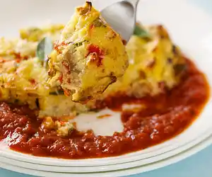 Baked Polenta with Italian Sausage, Mushrooms & Three Cheeses