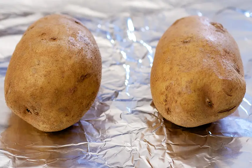 First prepare the potatoes.