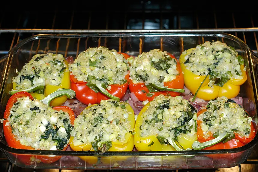 Yellow Peppers Stuffed with Quinoa, Corn & Feta Cheese