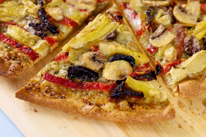 Basil Pesto, Artichoke Hearts, Sun-dried Tomato & Roasted Bell Pepper Pizza