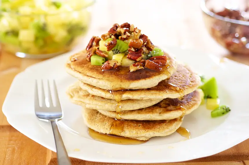Whole Wheat Pancakes with Maple Candied Pecans & Tropical Fruit