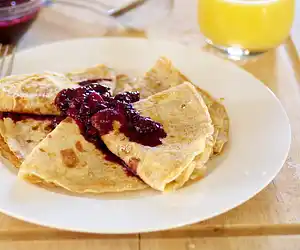 Breakfast Crepes with Warm Berry Sauce