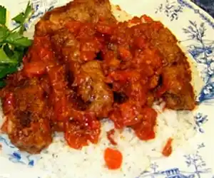 Greek Meat Rolls in Tomato-Wine Sauce