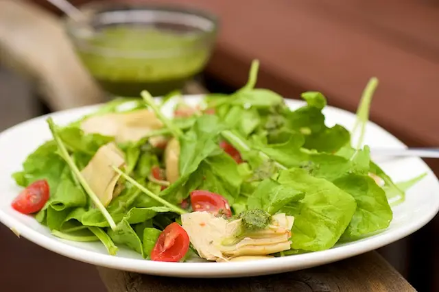 Arugula, Artichoke & Cherry Tomato  Salad with Pesto Vinaigrette