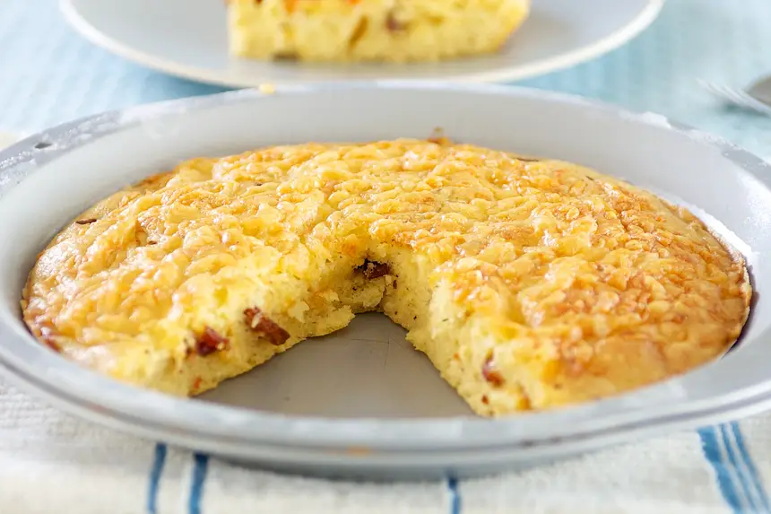 Cut into wedges and serve warm.