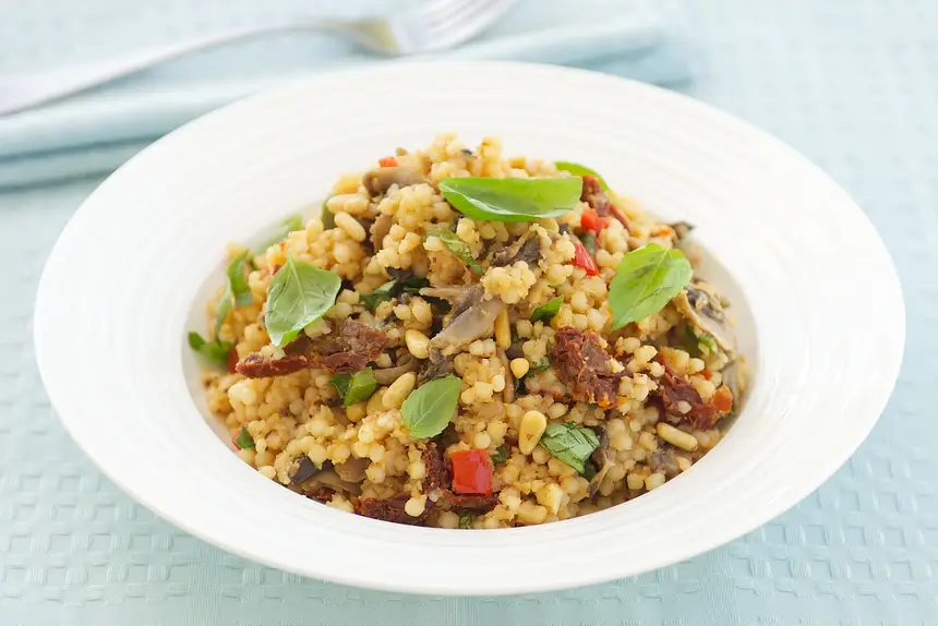 Israeli Couscous with Sauteed Mushrooms, Pine Nuts & Sun-Dried Tomatoes 