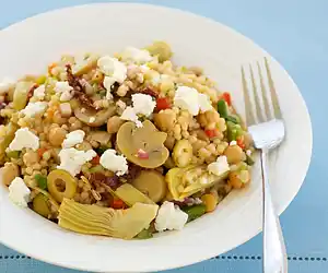 Chickpea, Marinated Artichoke Hearts, Mushrooms, & Sun-Dried Tomato Couscous Salad with Feta