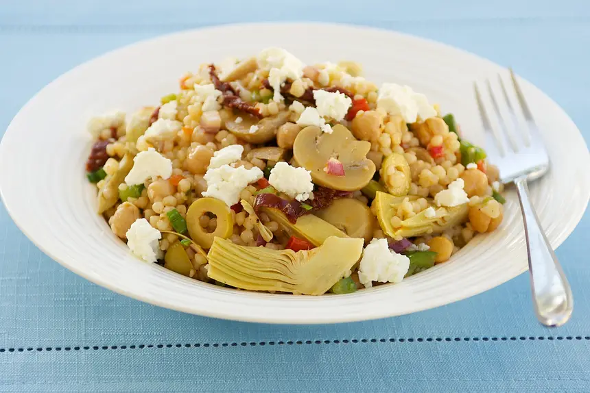 Chickpea, Marinated Artichoke Hearts, Mushrooms, & Sun-Dried Tomato Couscous Salad with Feta