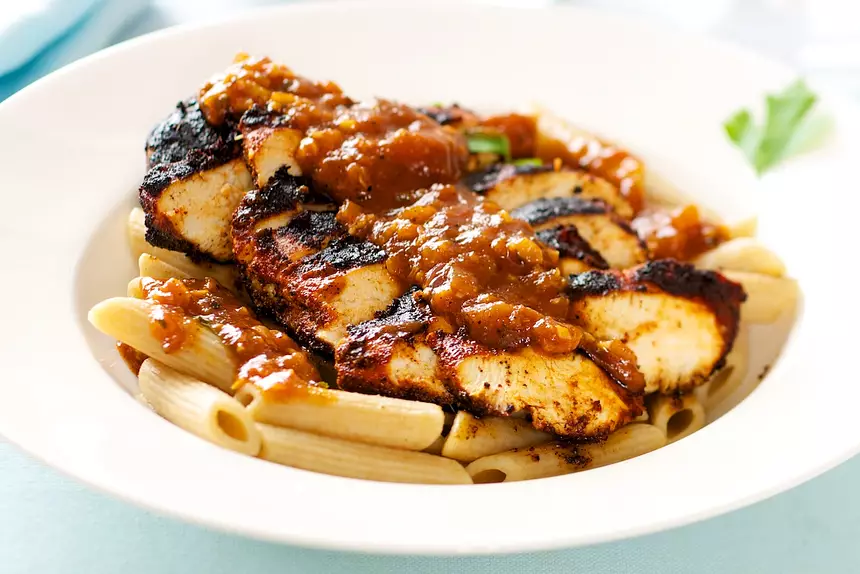 Blackened Chicken Strips on Pasta with Cajun Sauce
