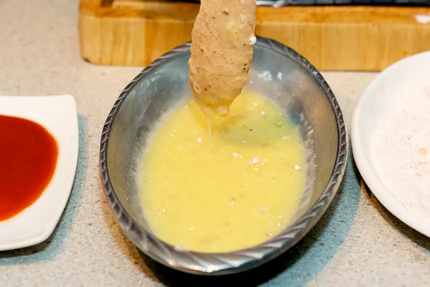 and then double dip the chicken into the egg mixture again.