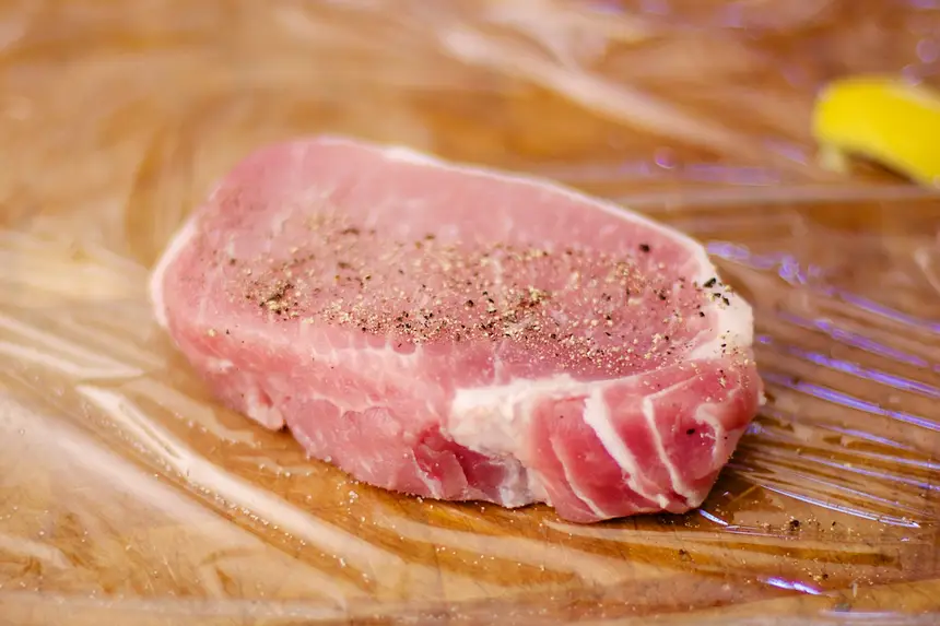 Season the pork chops