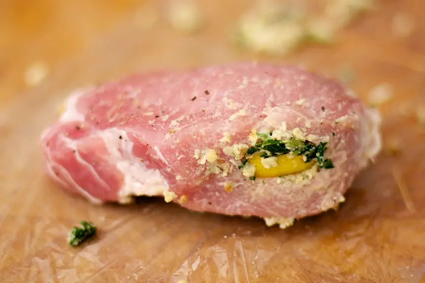 Stuff the pork chop with equal amoutn of stuffing.