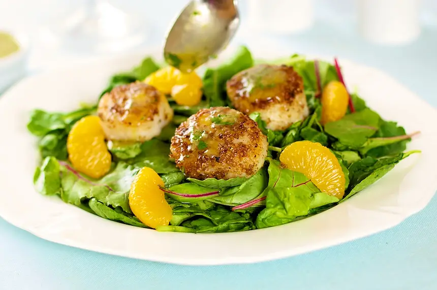 Coriander Spiced Scallops with Orange Ginger Dressing & Greens