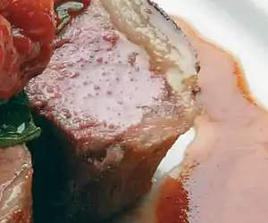 Lamb Loin with English Spinach Semi Dried Tomatoes & Bush Tomato Chutney