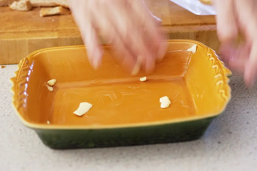 Buttered (greased) casserole dish