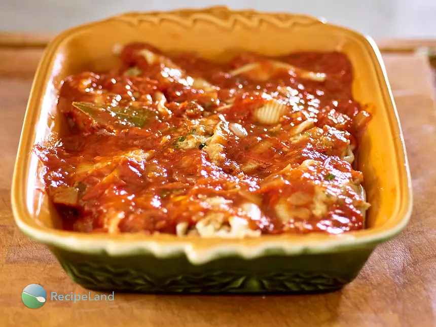 Beef stuffed inside large pasta shells topped with gooey cheese then baked to perfection. Make-ahead and it