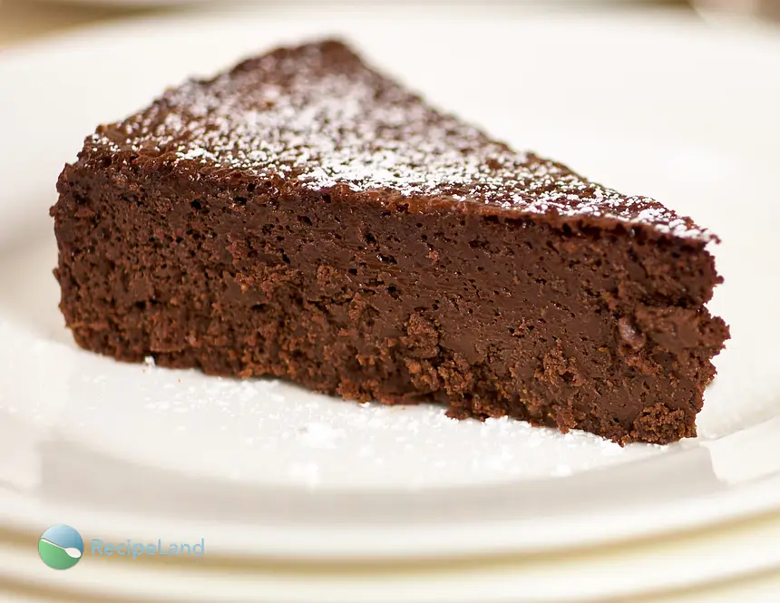 Close-up of a slice of Gluten-free Chocolate Mousse Passover cake on a white plate