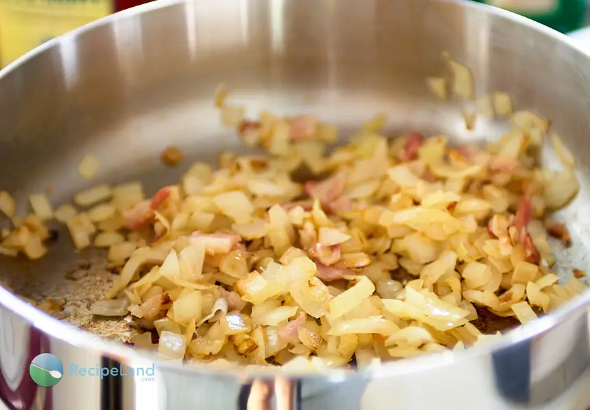 Onions and bacon in a saucier pan