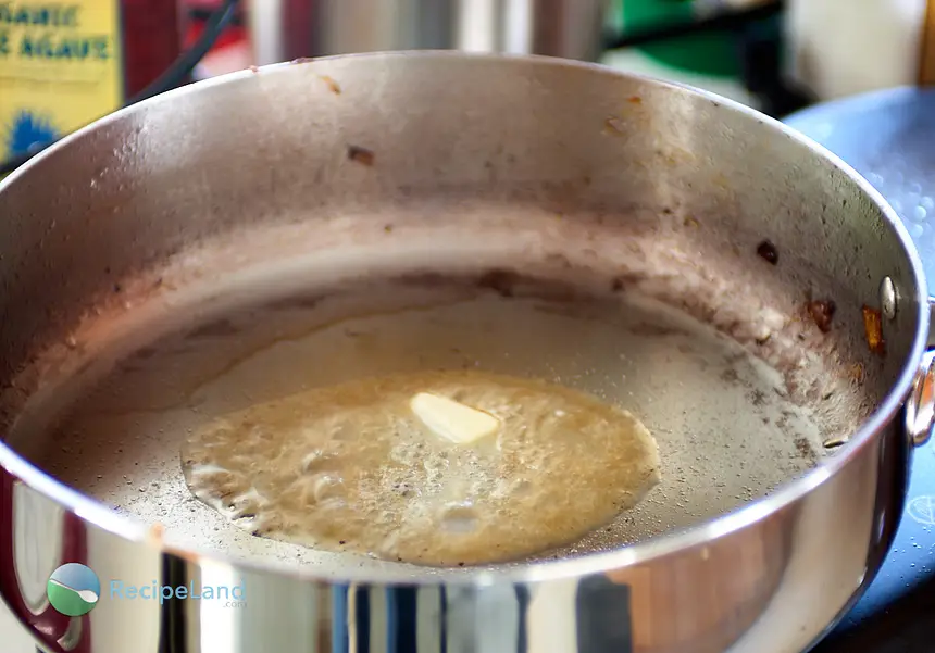 Melting butter in a saucier pan.