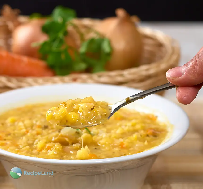 Close-up of a spoonful of yellow-split pea soup