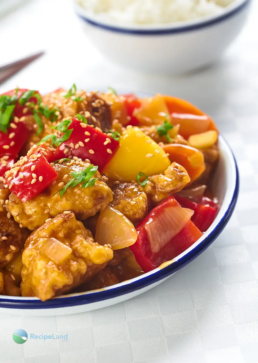 Asian cod recipe. Asian marinated meaty cod with a crispy coating, colorful tender-crisp veggies, all glazed with a sweet-sour sauce.