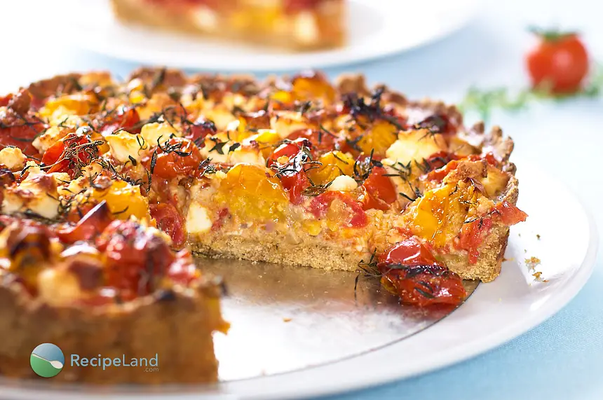 This delicious savory tart is made with roasted cherry tomatoes, feta cheese, and fresh herbs. It’s cheesy, sweet, juicy and very tasty. You can have it as an appetizer or a main dish!