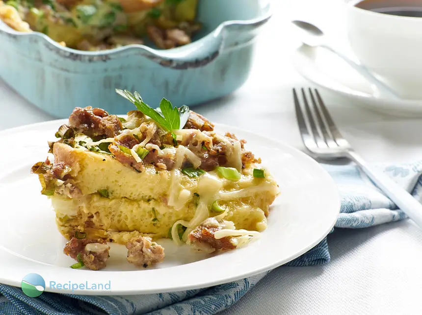 Authentic sausage casserole done right. Creamy custard-like interior with crispy edges and two cheeses interwoven. Say no-more. Make-ahead makes it painlessly delish.