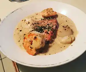 Pesto Salmon & Sea Scallops with Shallot Sauce