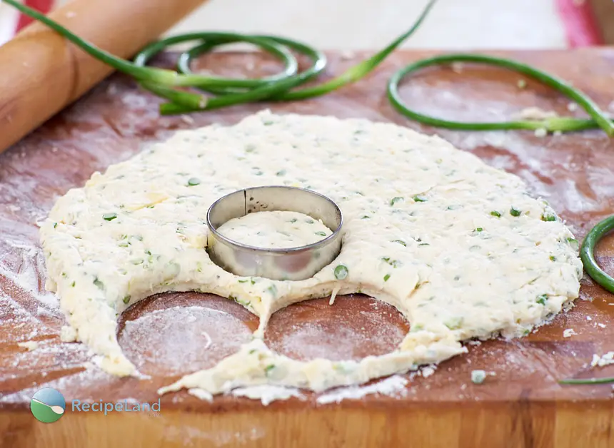 Cutting garlic scape biscuits