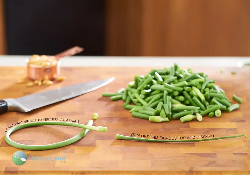 Turn garlic scapes into fluffy, cheesy buttermilk biscuits. The garlic scapes add a fresh mild hint of garlic to the savory biscuits which is perfectly complimentary.