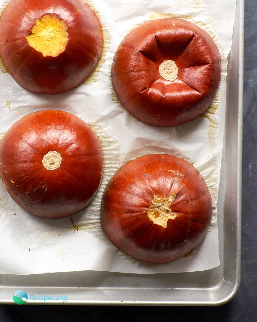 Sugar pumpkin halves cut side down after baking for 45 mintues.