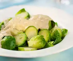 Cheesy Brussels Sprouts with Sherry Asiago Sauce