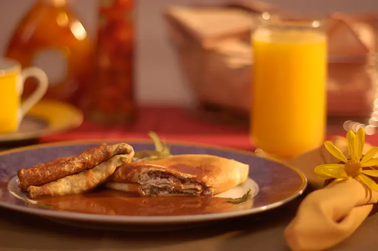 California Goat Cheese Crepes with Sweet Onion Sauce