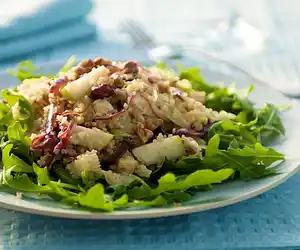Quinoa & Arugula Salad with Pears, Walnuts, Dried Fruits, & Jack Cheese