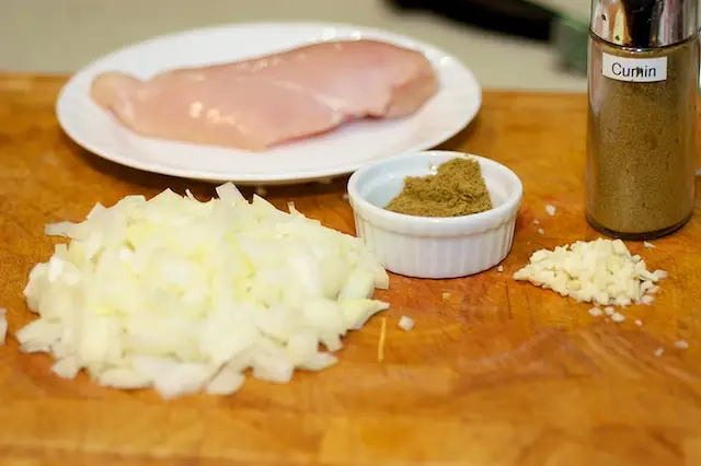 Poach the chicken breasts